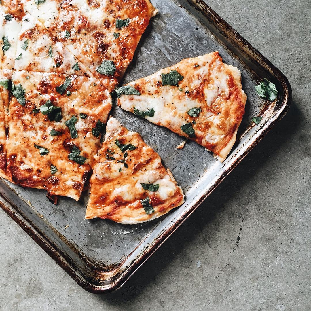 And then buried under a ton of lightly dressed arugula for saladpizza dreams.