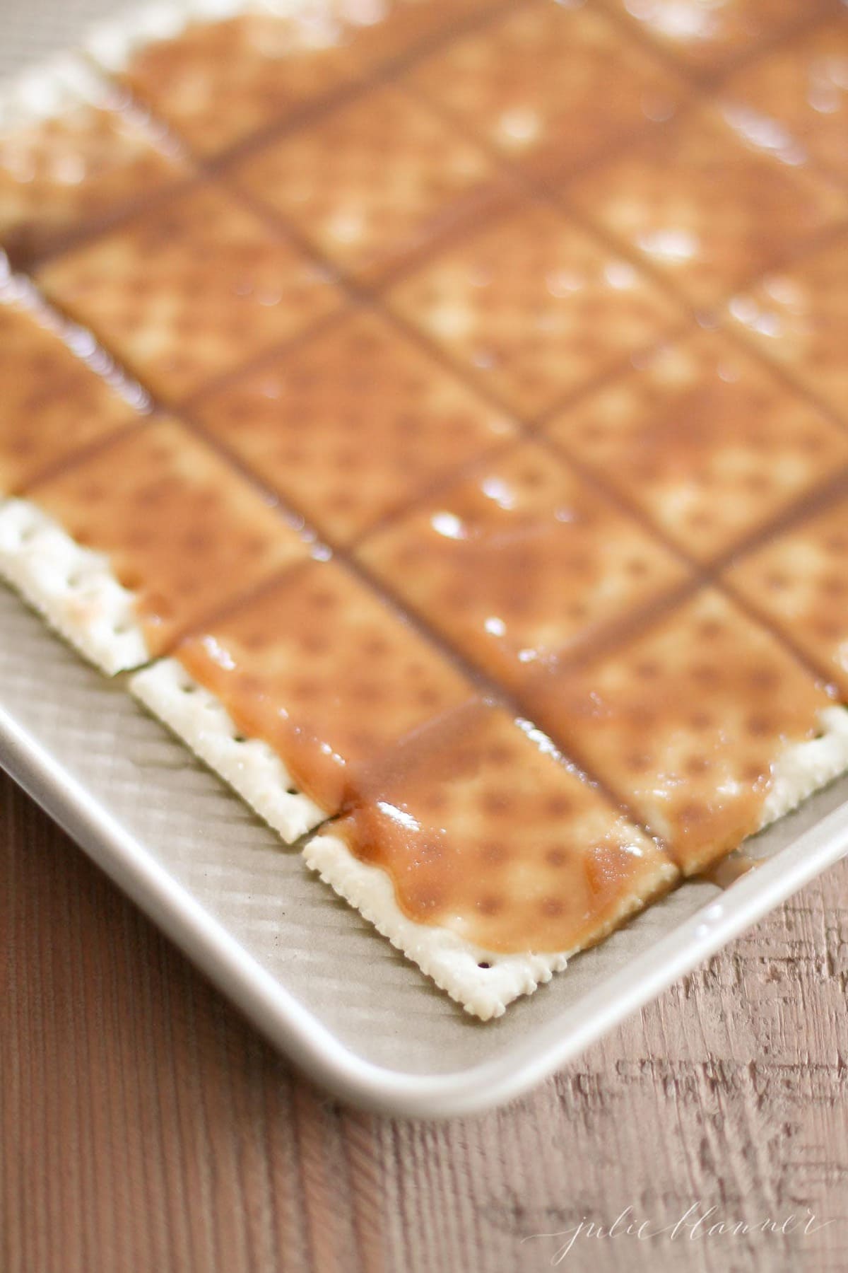 butter and brown sugar mixture on crackers to make toffee