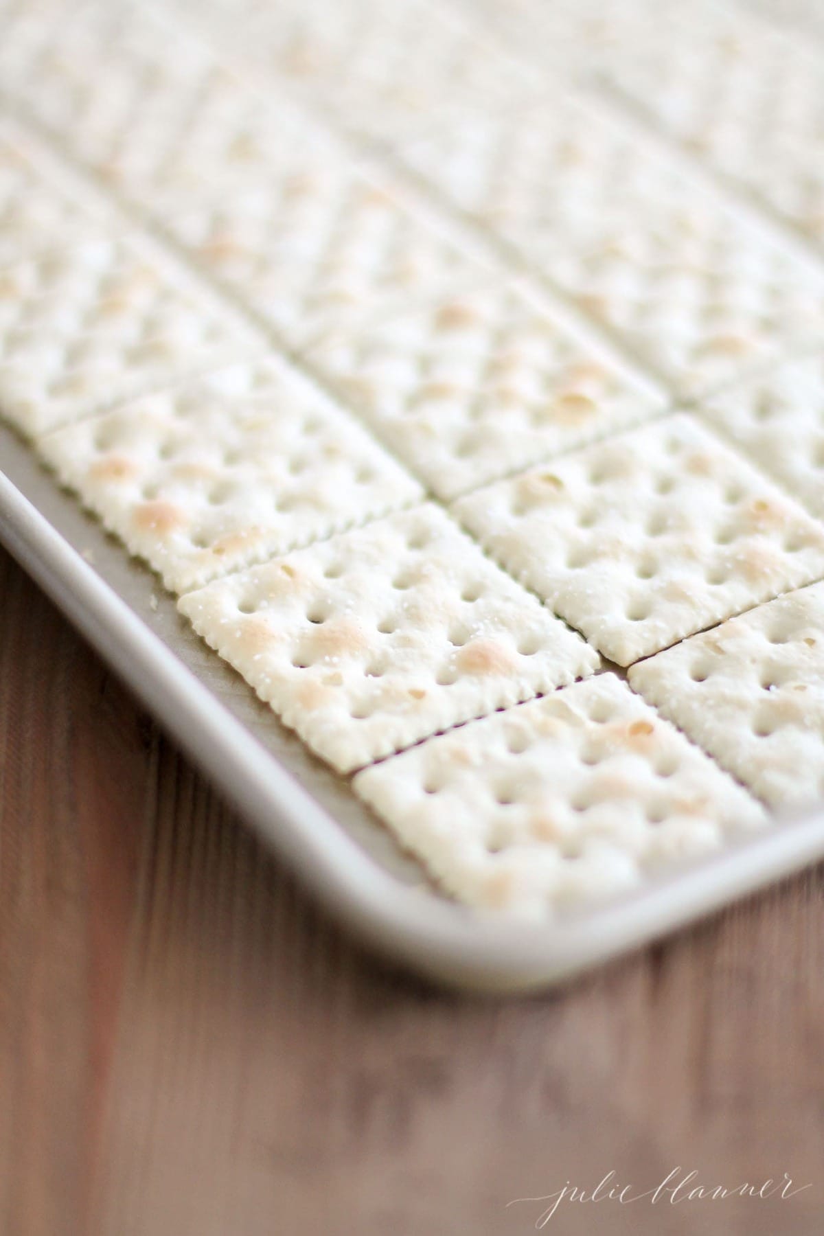 saltine crackers on jelly roll pan