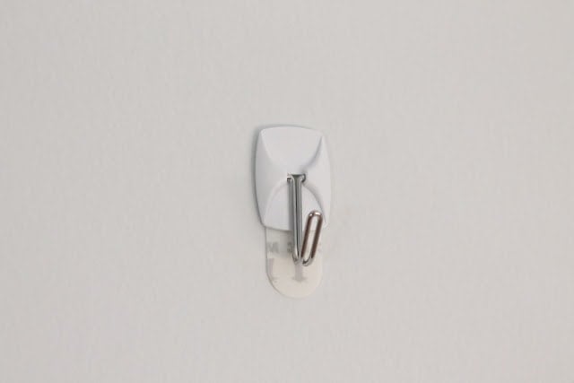 A close up of a wall hook