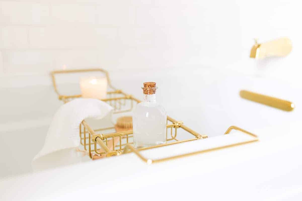 bath tub with brass bath tray