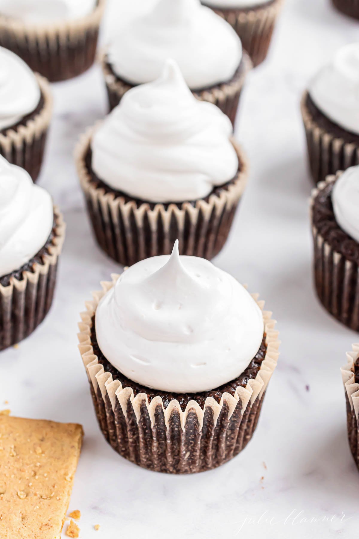 Chocolate cupcakes topped with marshmallow icing