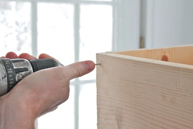 adding screws to the window box