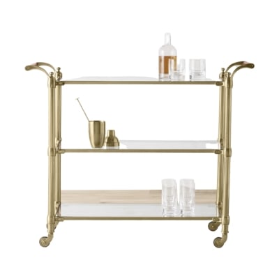 A gold bar cart against a white background.