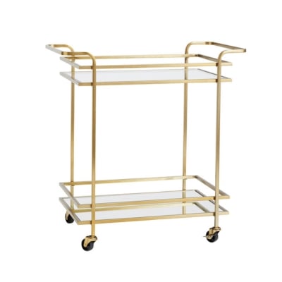 A gold bar cart against a white background.