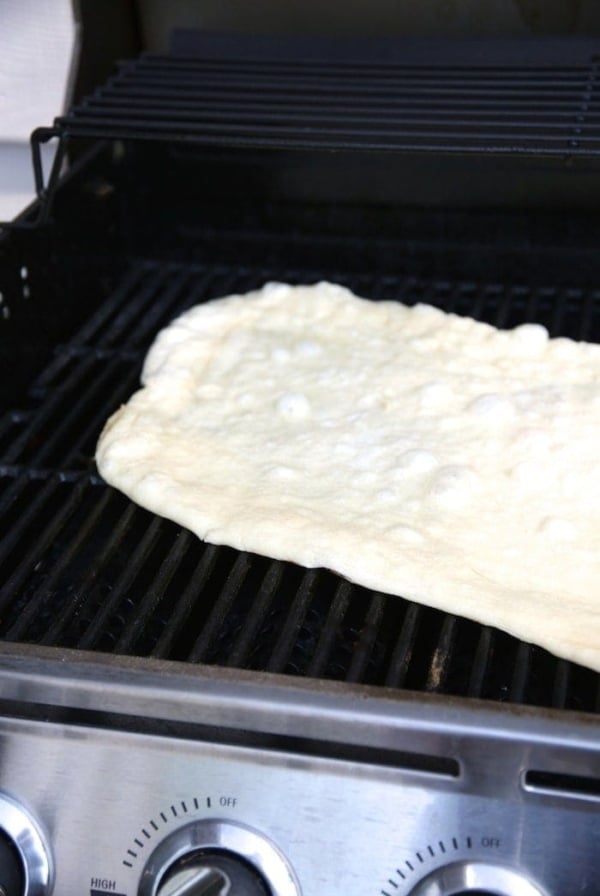 pizza dough on grill