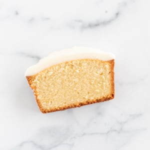 Pound cake slice covered in a pound cake glaze.