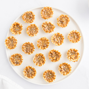 Mini Pecan Pie bites on a plate.