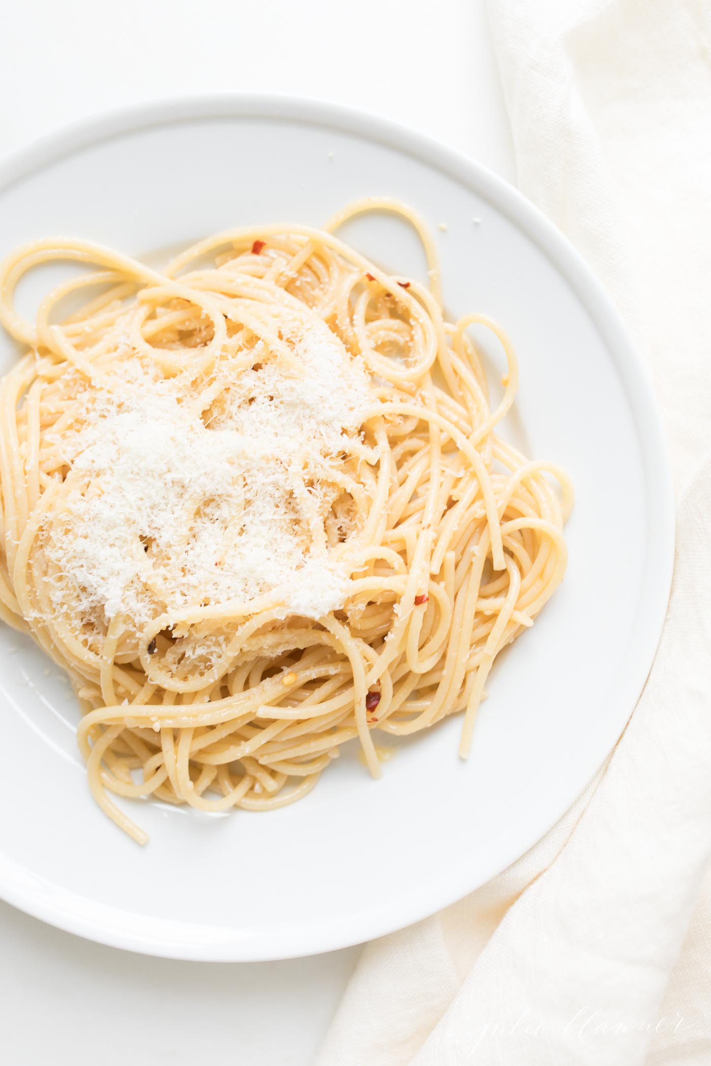 aglio e olio on a white plate