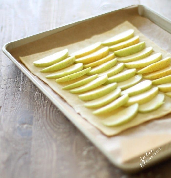 Sliced apples laid on the puff pastry