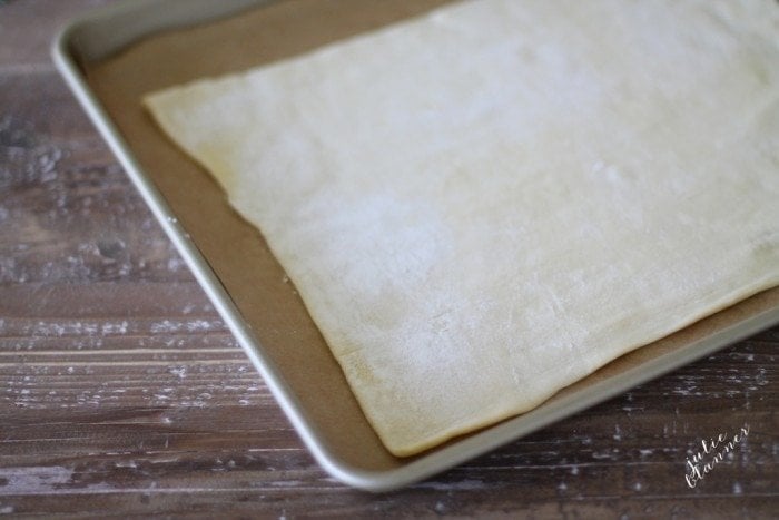 Parchment and puff pastry on a baking sheet