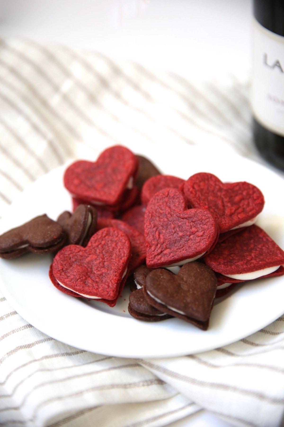 Heart shaped homemade red velvet oreos.
