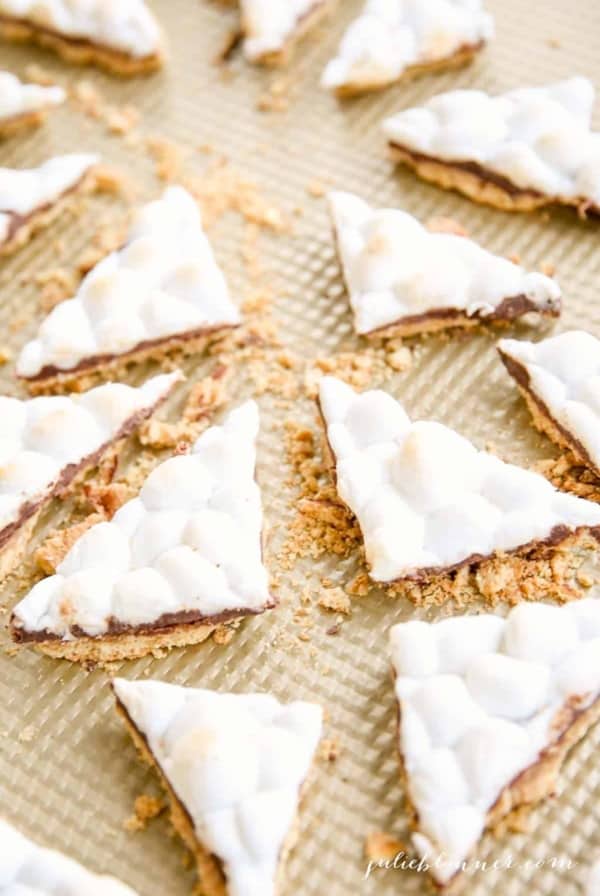 broken smores toffee on gold baking sheet