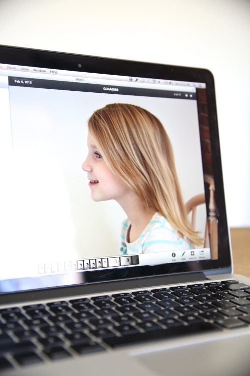 Computer screen with girl's profile image. 