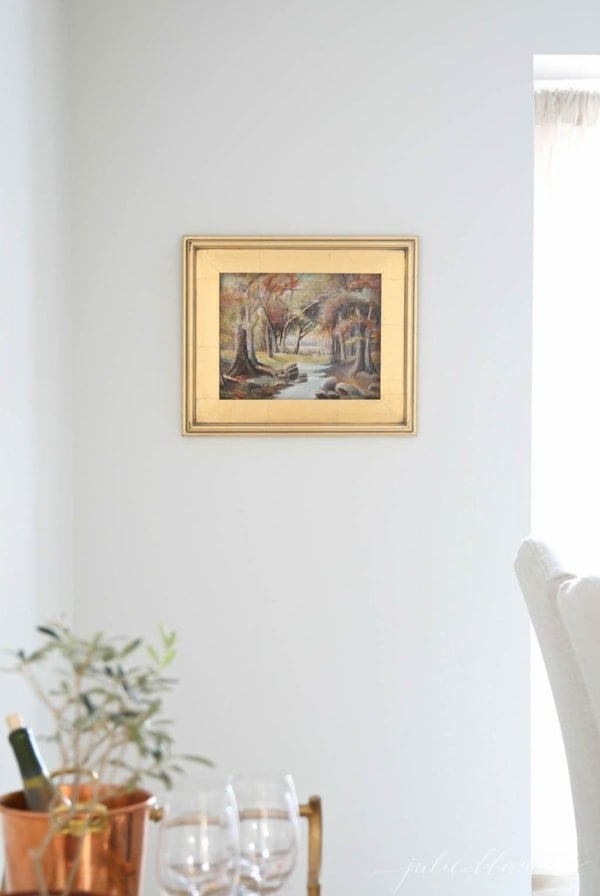 Our dining room in progress - balancing dark wood furniture & minimizing dated features