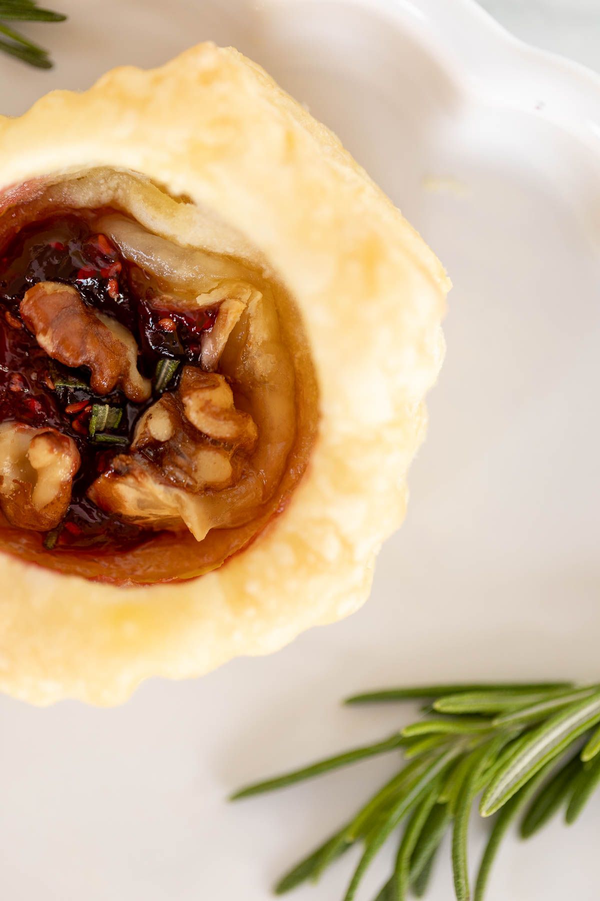 Brie bites puff pastry topped with pecans