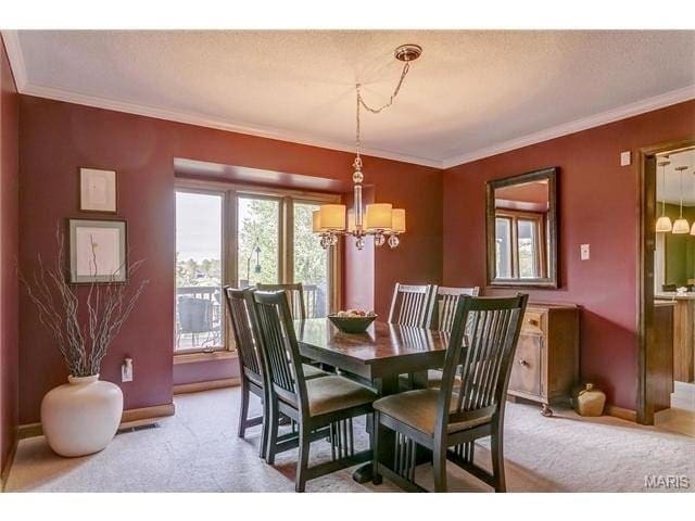 Our dining room in progress - balancing dark wood furniture & minimizing dated features