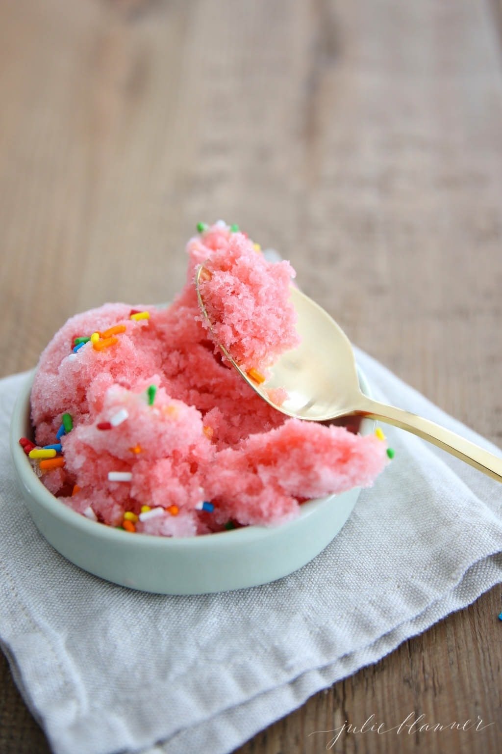 pink snow ice cream on spoon