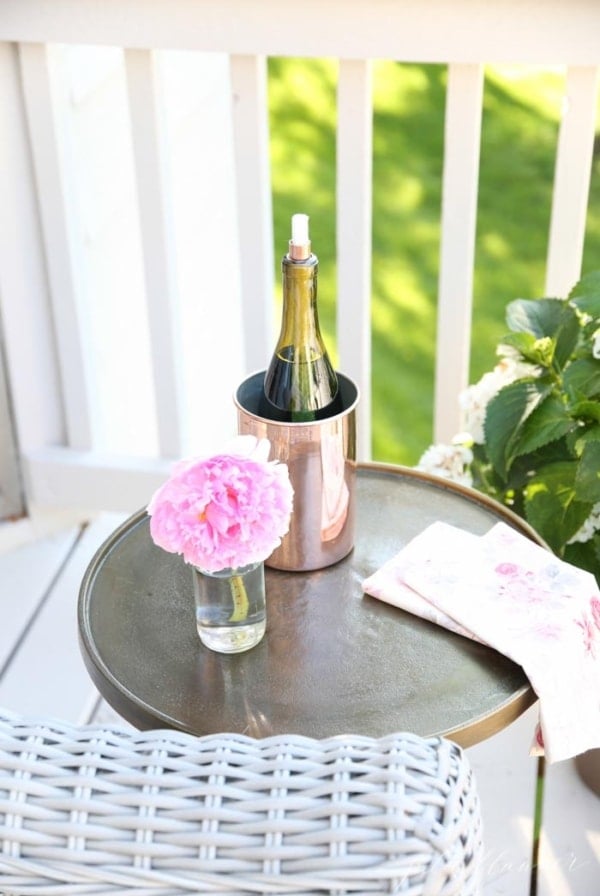 DIY Wine Bottle Tiki Torch | Add ambience while deterring bugs this summer with a tiki torch made from a wine bottle in less than 10 minutes!