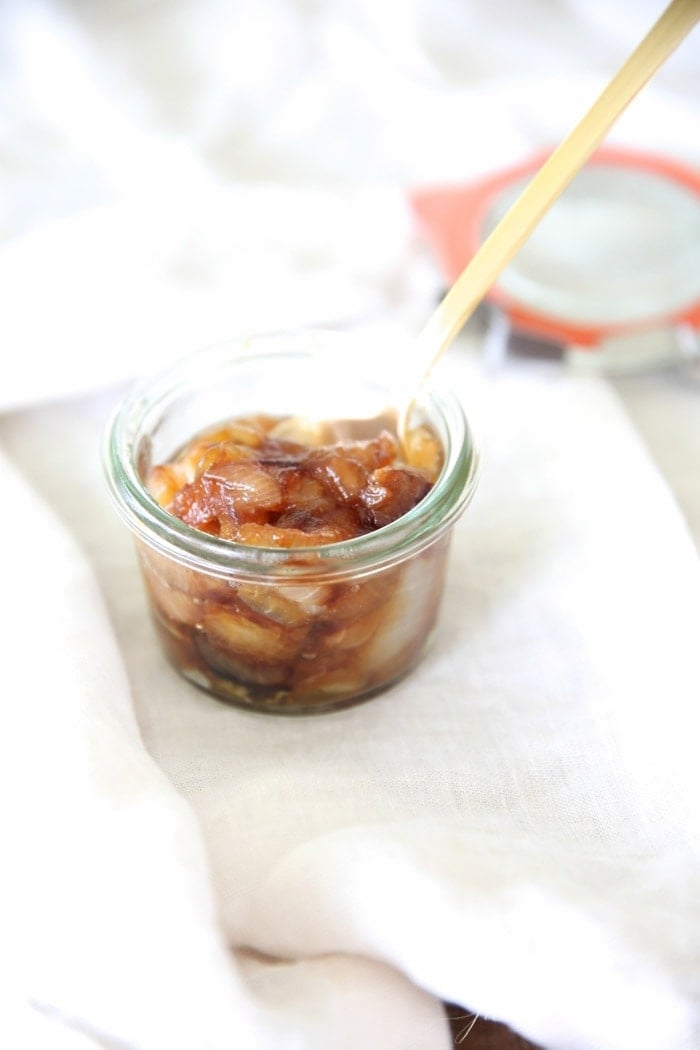 Cooked onions in a glass jar