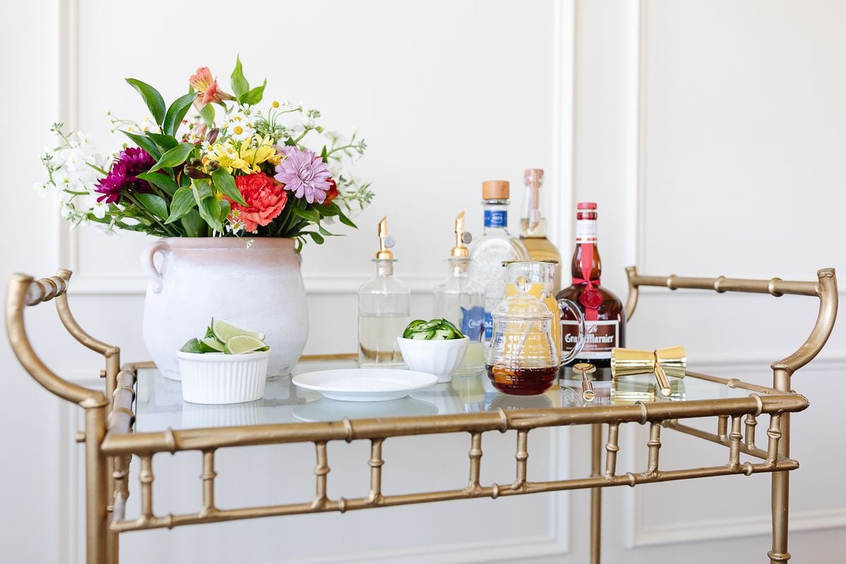A margarita bar on a gold bar cart