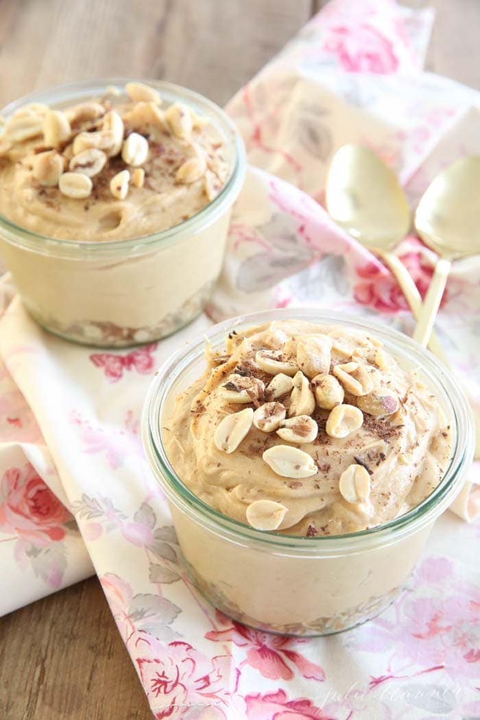 Two Peanut Butter Pies in jars on a floral cloth