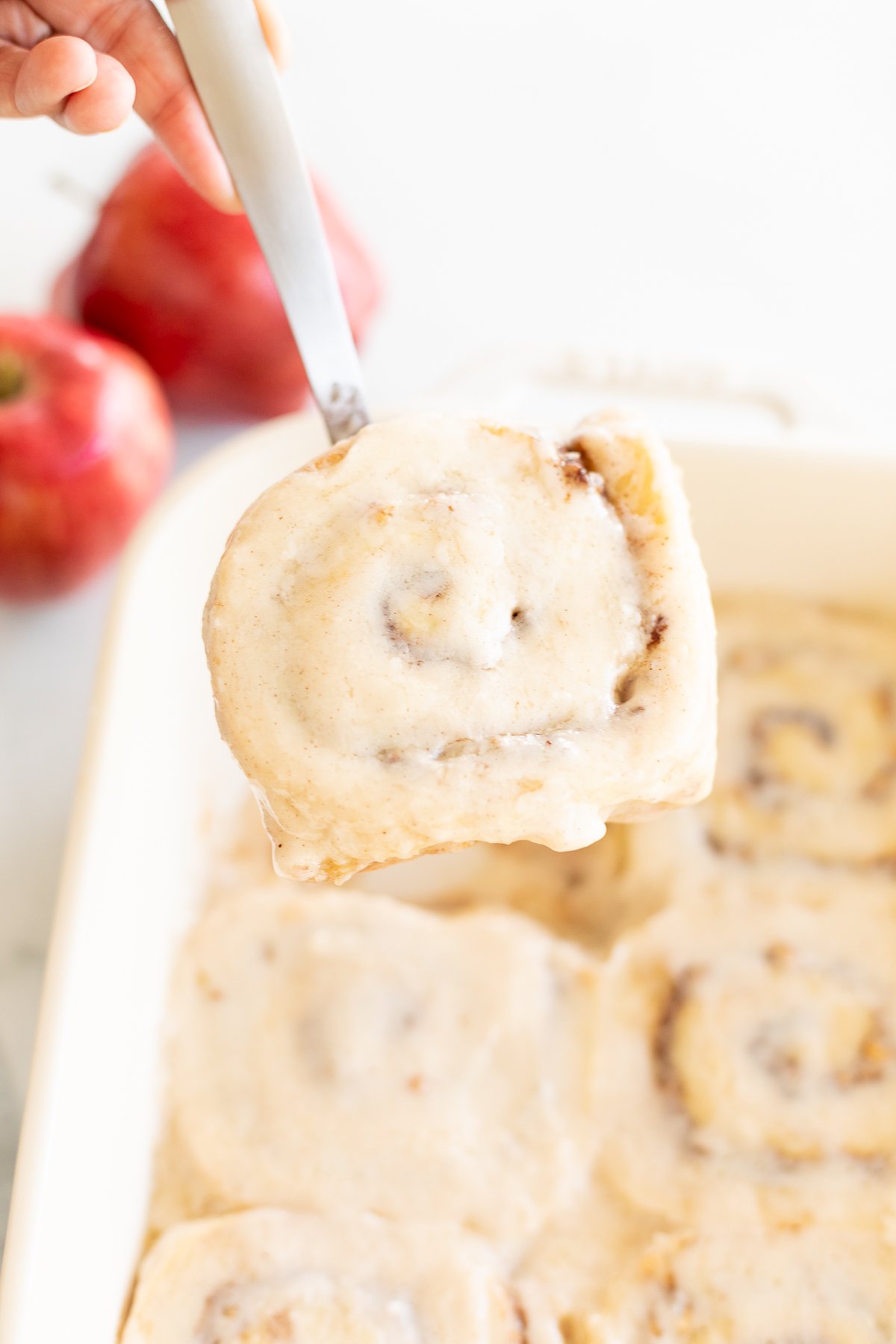 Apple cinnamon rolls baked in a dish.