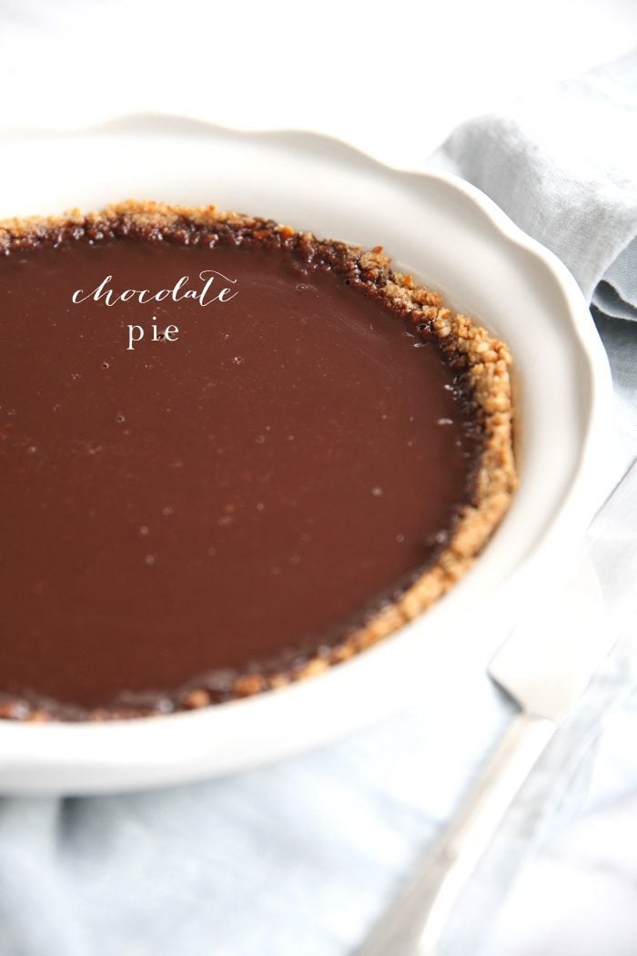 chocolate pie in white baking dish with text overlay