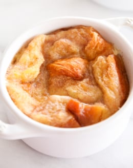 bread pudding in an individual, white baking dish