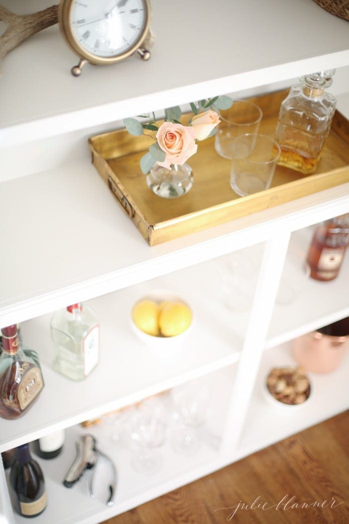 Lifestyle blogger Lifestyle Gleam converted her built in bookcases into a beautiful bar cabinet