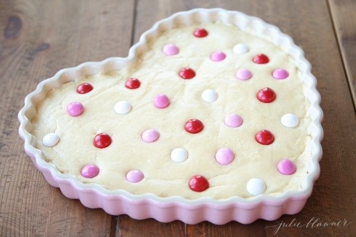 The sugar cookie cake decorated with m&ms