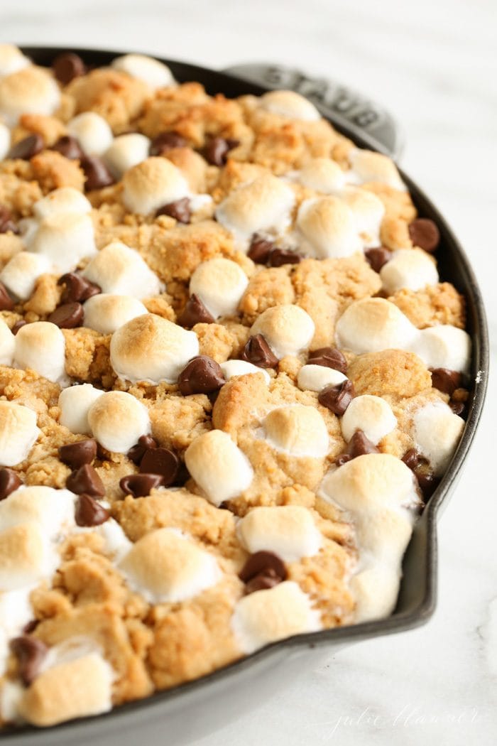 Ridiculously good and incredibly easy peanut butter s'mores pie recipe. You'll always have a crowd pleasing dessert on hand with this s'mores pie.