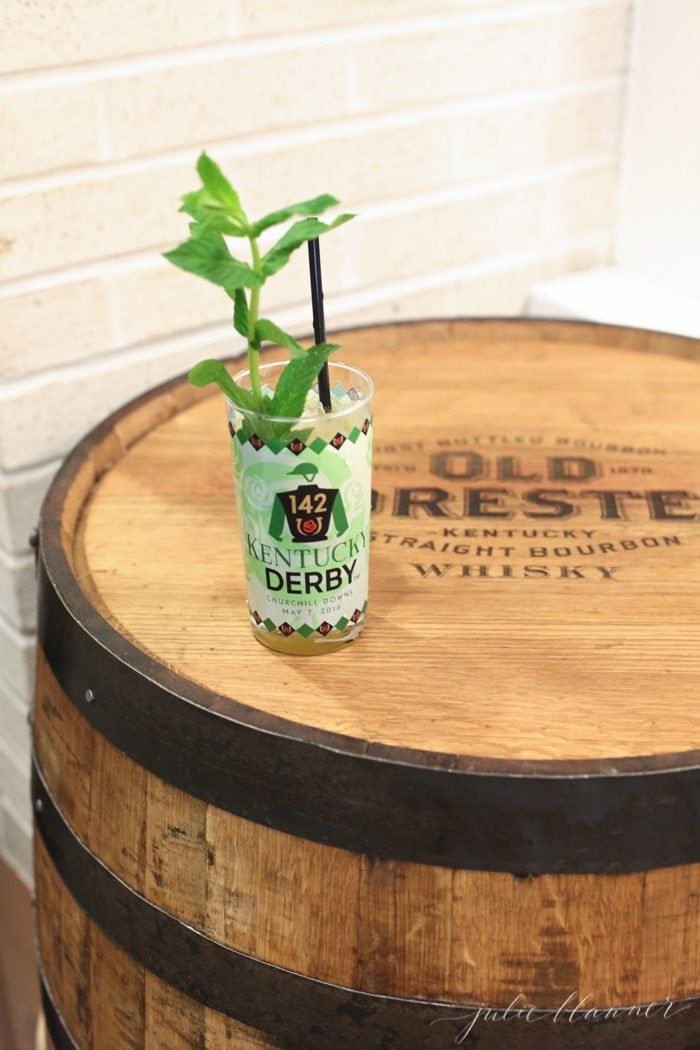 A Kentucky Derby cocktail on a barrel