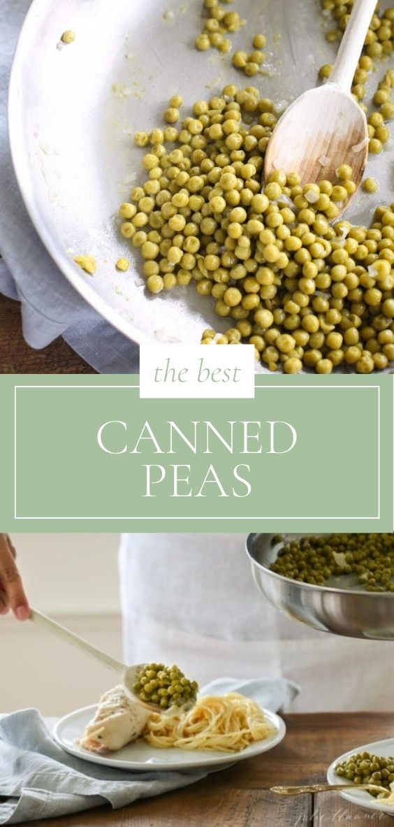 Next to a grey napkin, there is a silver pan of canned peas cooking with a wooden spoon.