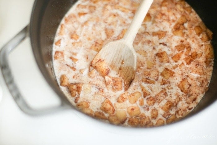 Milk added to the pan with the apple