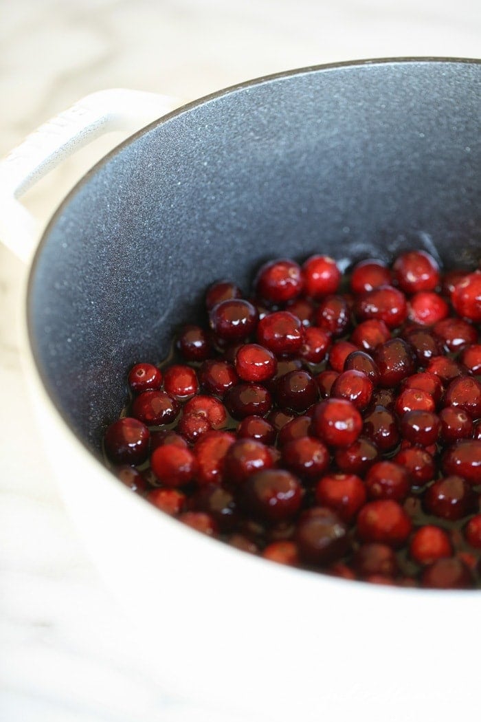 Cranberries cooking in a pot