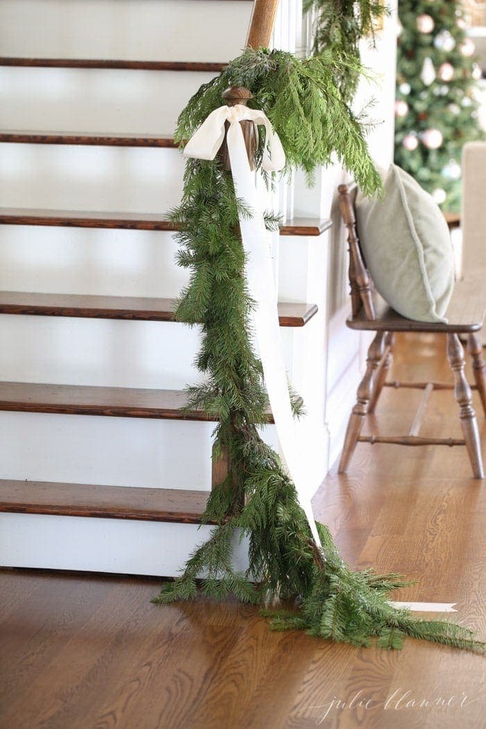 beautiful Christmas decorations | garland draped on banister