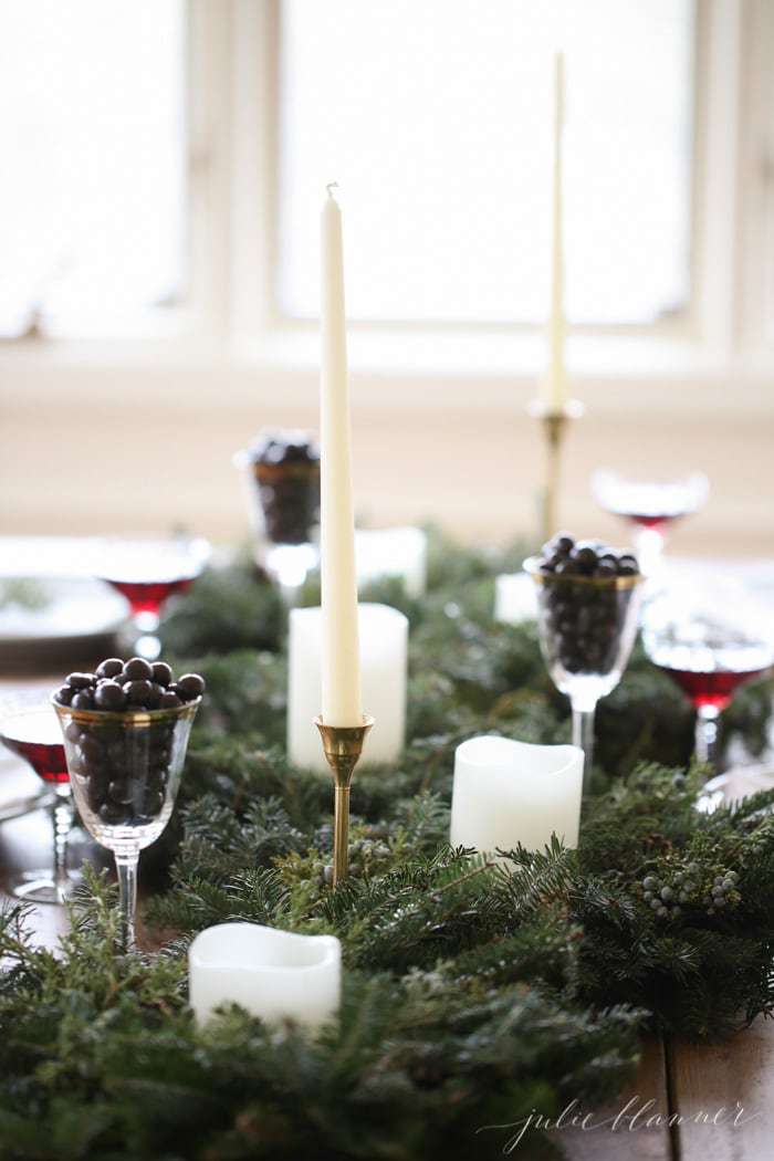 step by step instructions to create a simple holiday centerpiece from grocery store flowers 