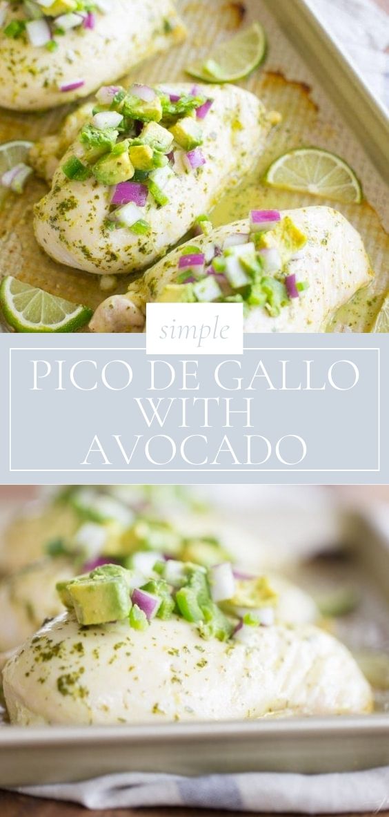 Pico de gallo with avocado is pictured atop chicken breast on a golden baking sheet.