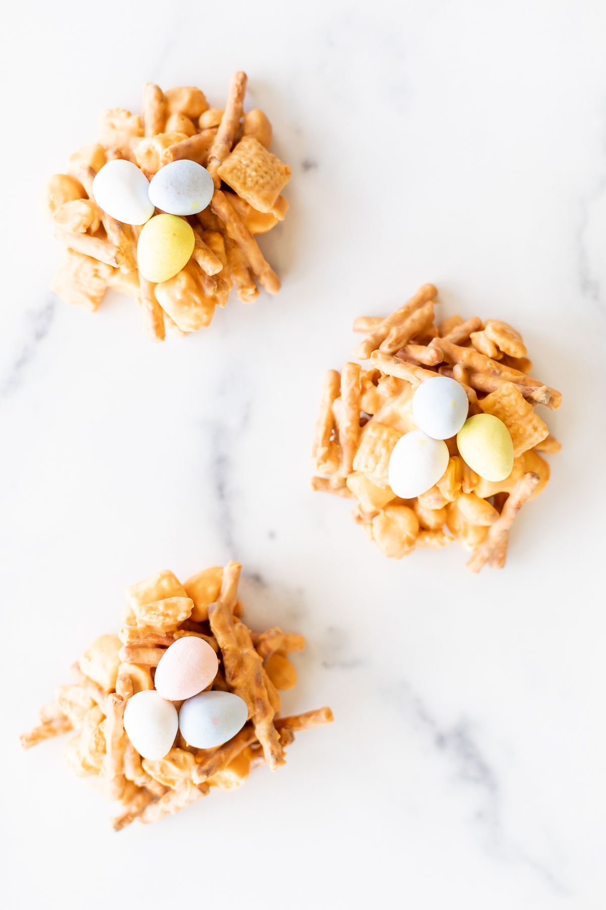 No bake birds nest cookies on a white platter.