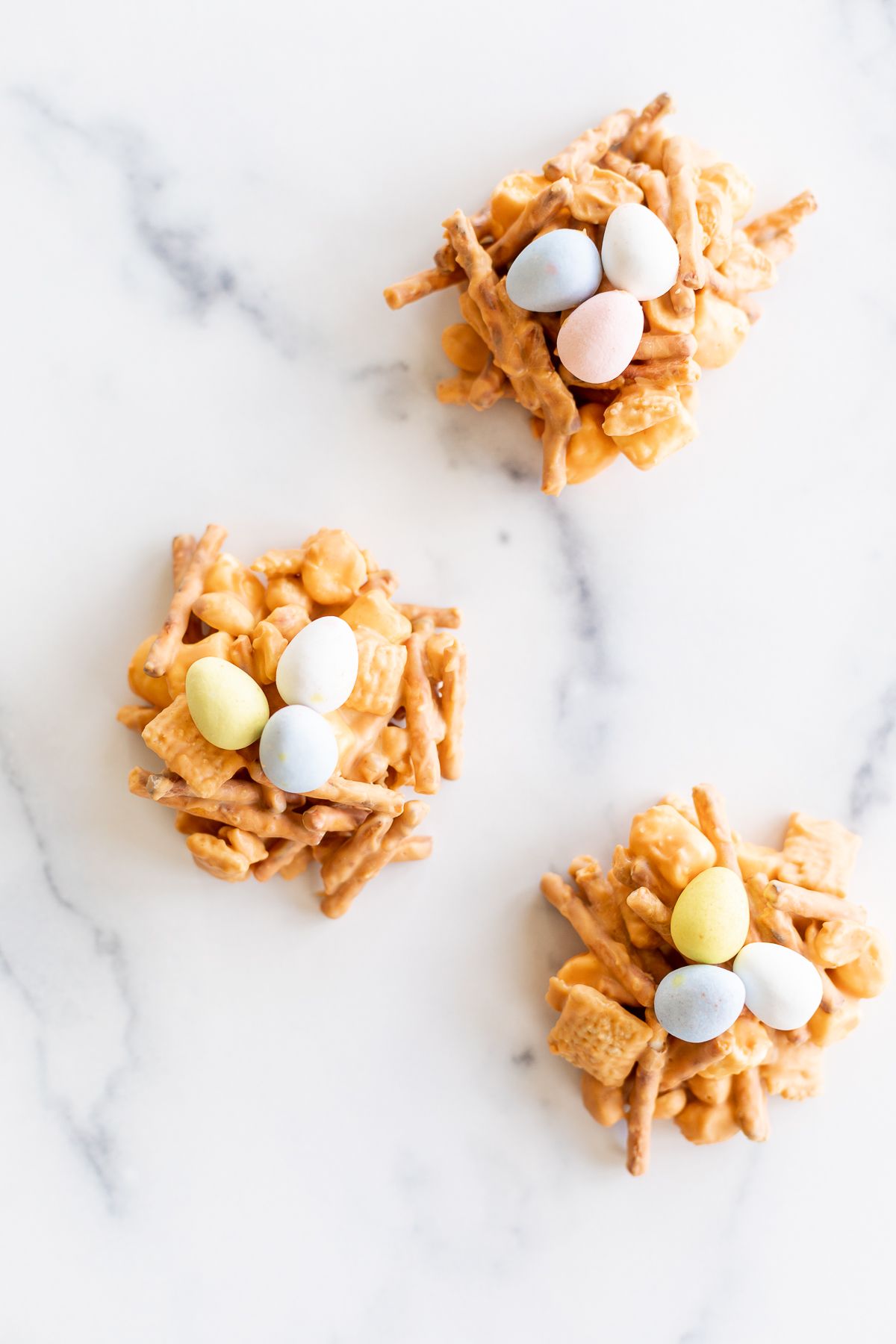 No bake birds nest cookies on a white platter.