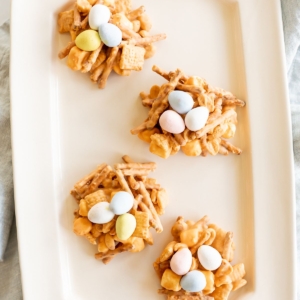 No bake birds nest cookies on a white platter.