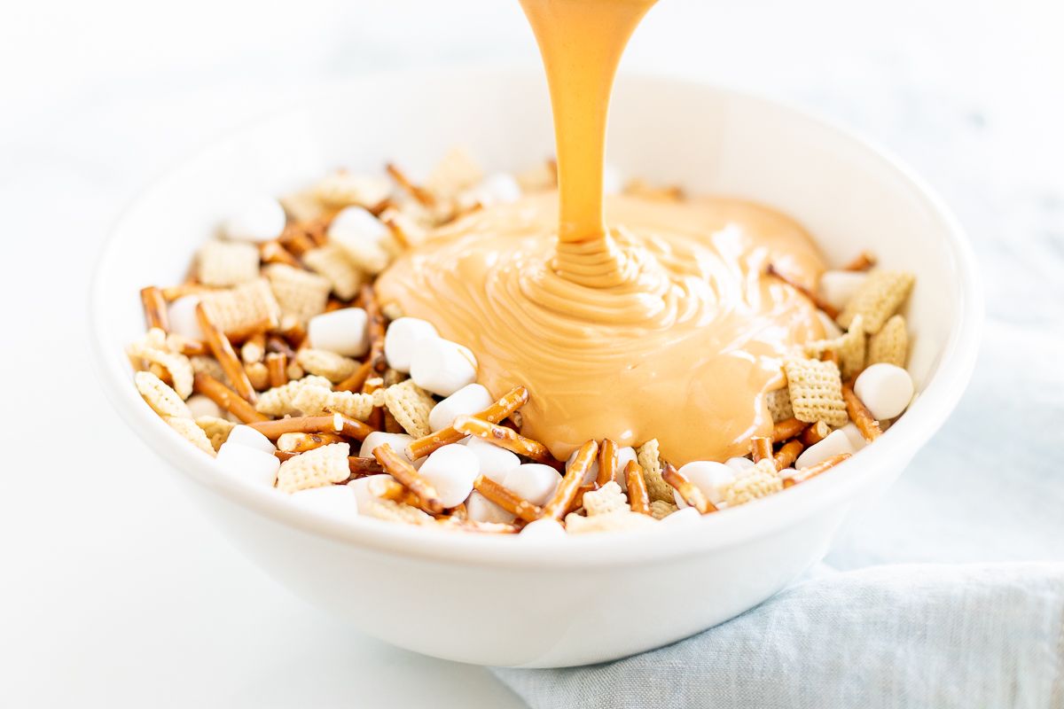 A bowl with ingredients for no bake birds nest cookies.