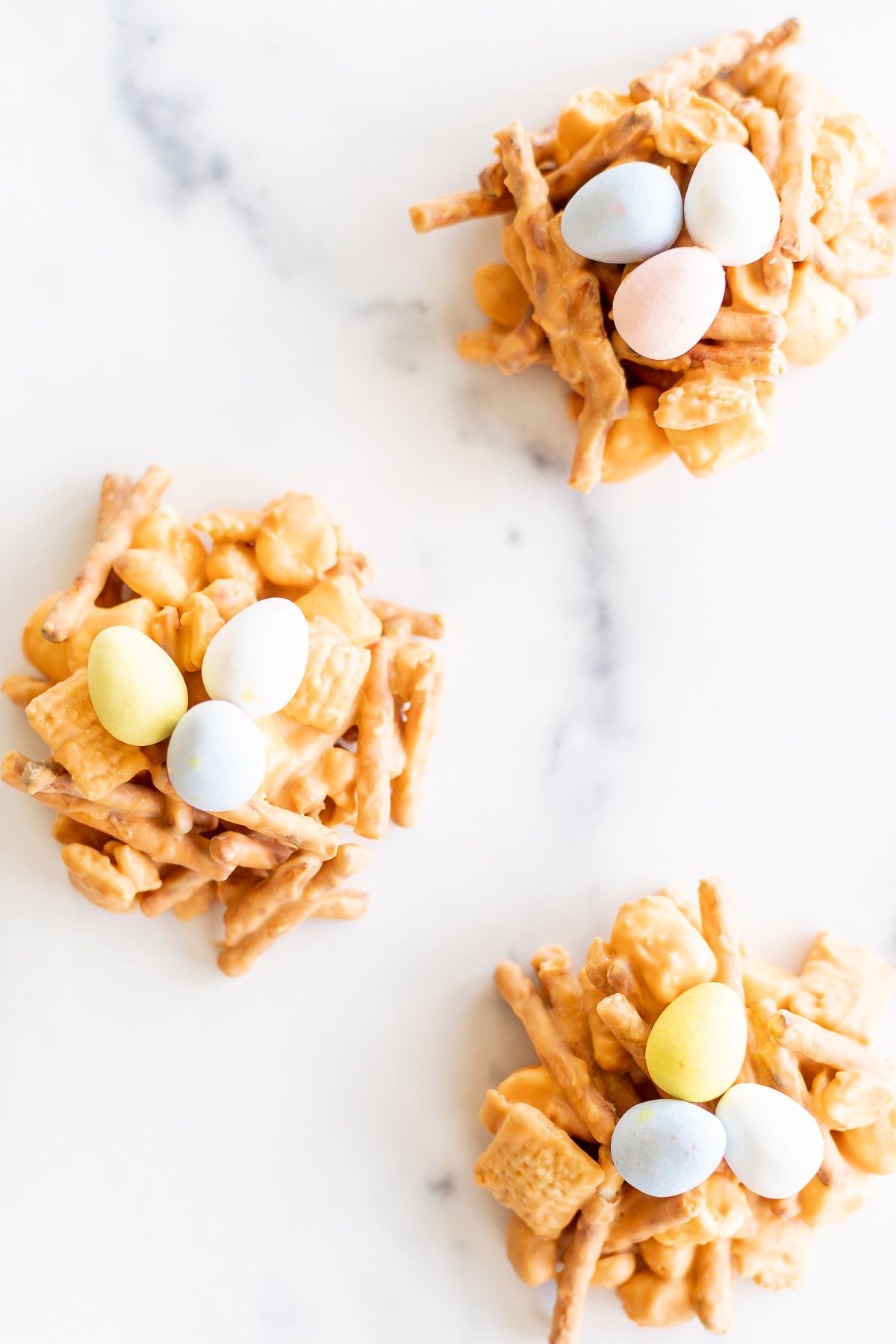 No bake birds nest cookies on a white platter.