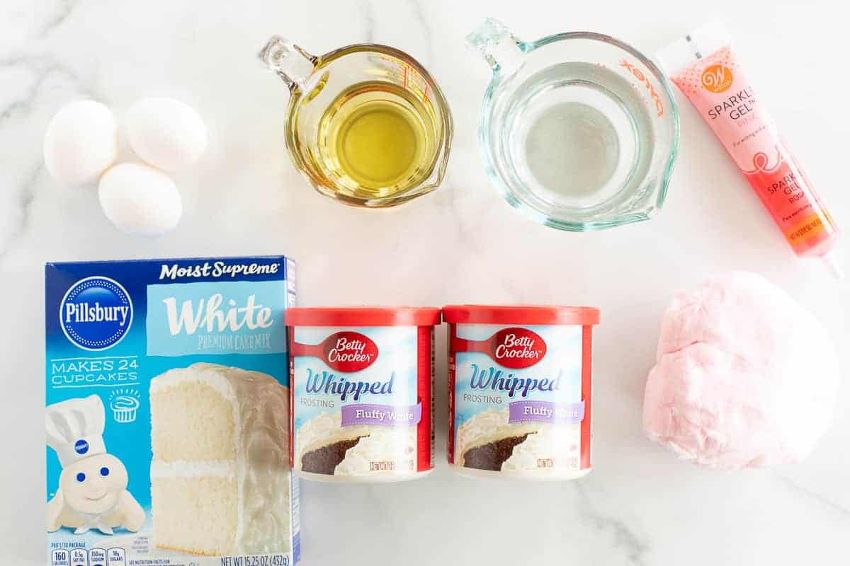 ingredients to make a bunny butt cake on marble surface