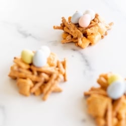 No bake birds nest cookies on a white platter.