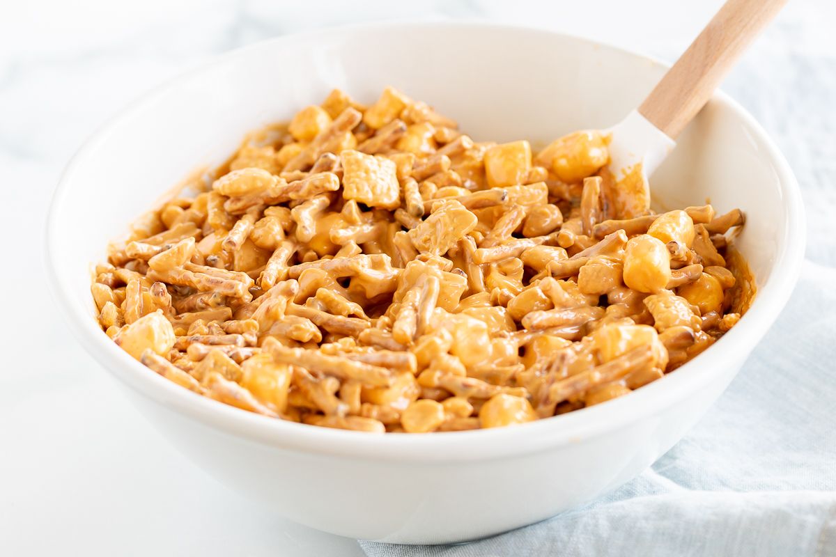 A bowl with ingredients for no bake birds nest cookies.