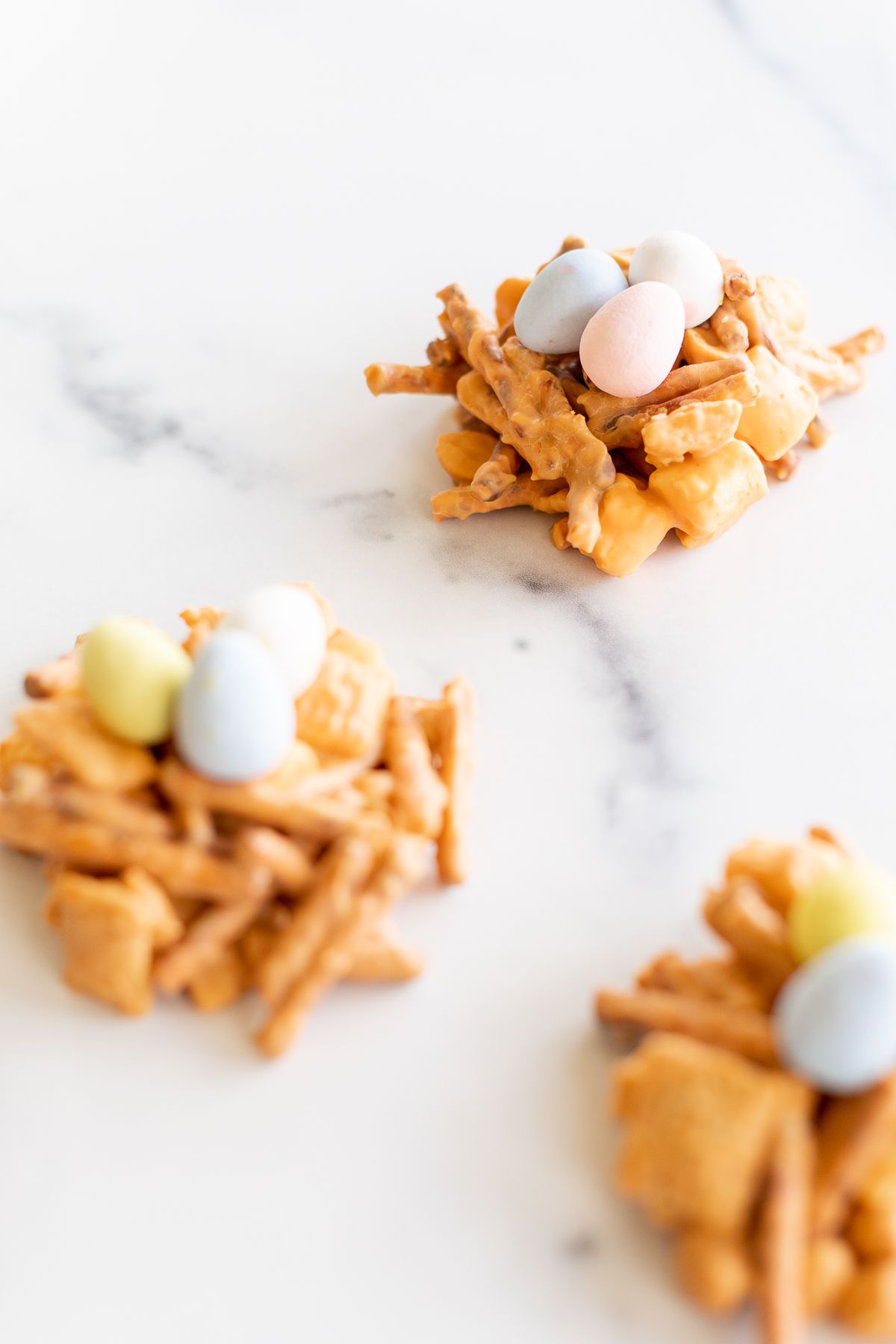 No bake birds nest cookies on a white platter.