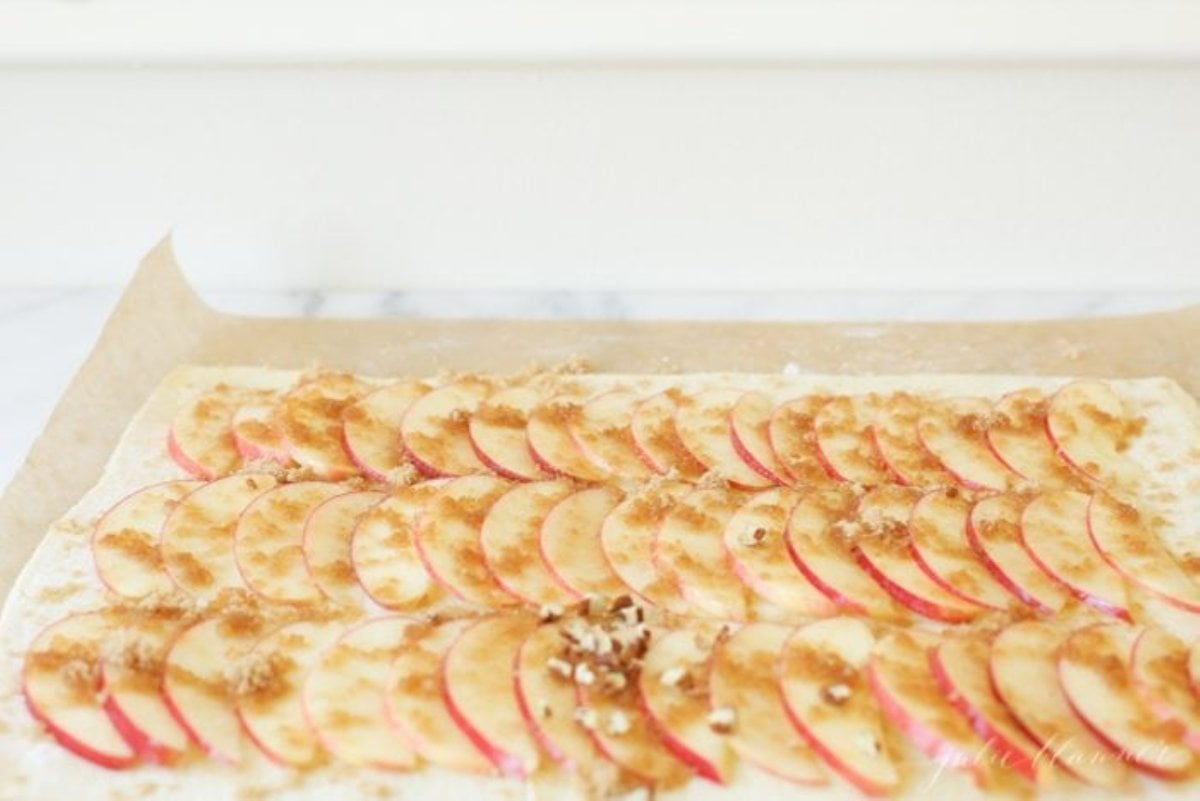 A fresh caramel apple tart before it goes into the oven.