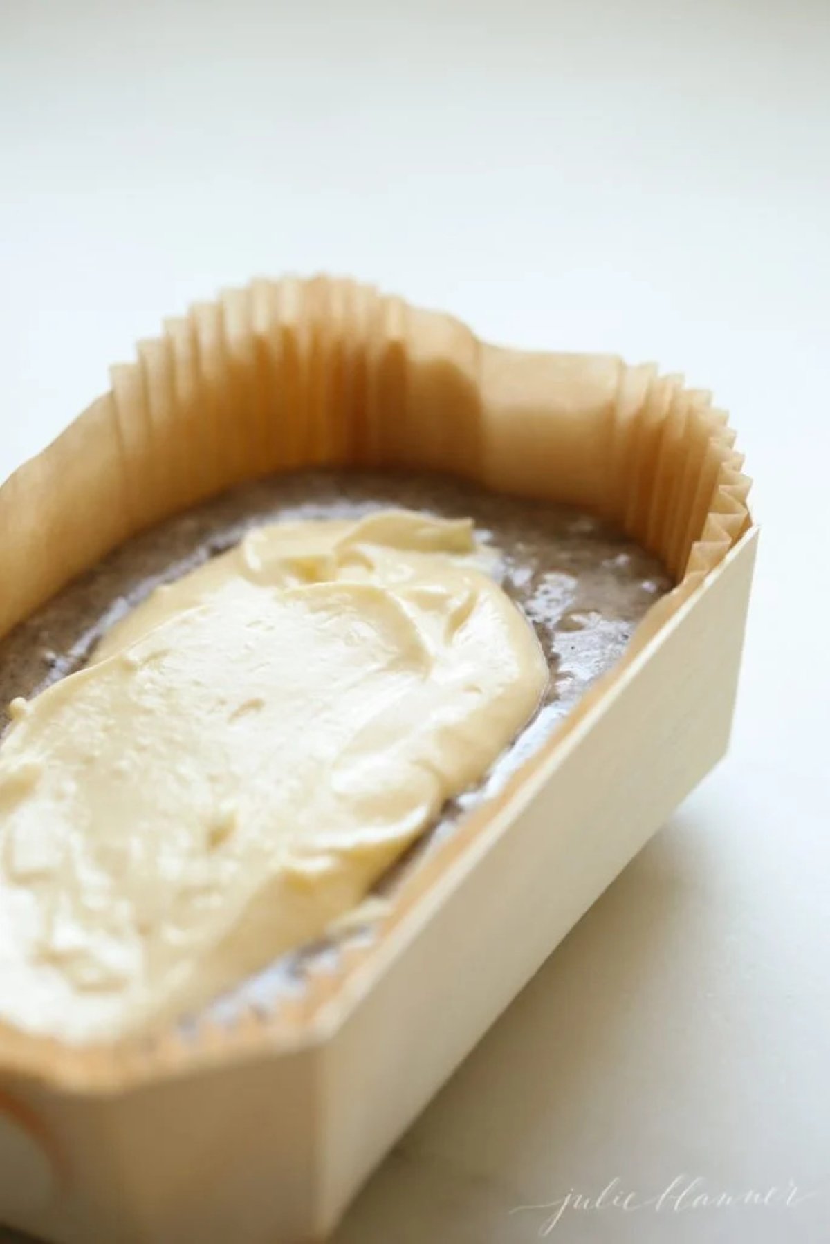 cookies and cream bread batter in a paper baking pan